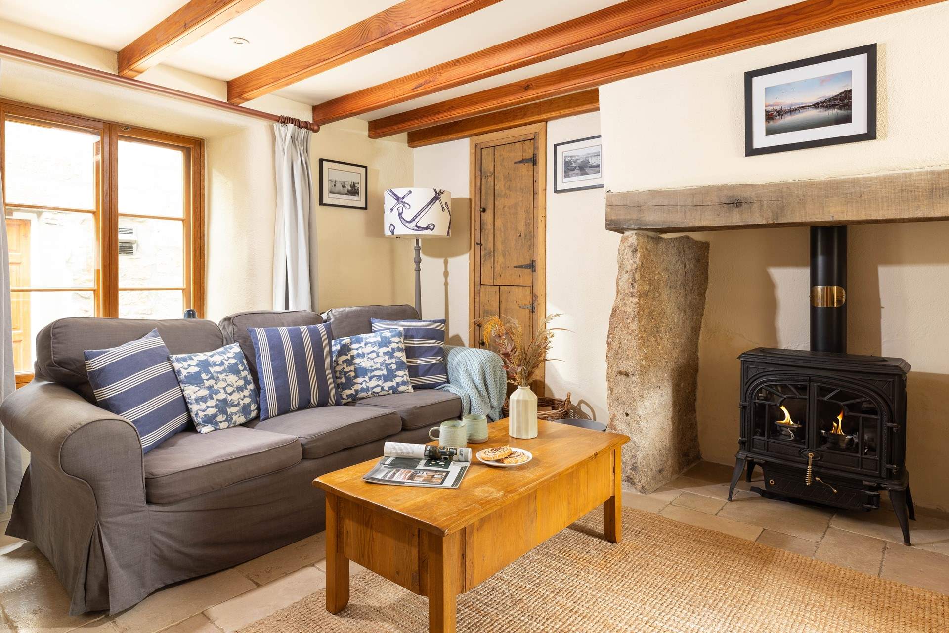 Sit back and relax by the cosy wood-burner.