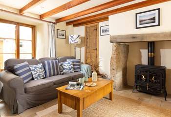 Sit back and relax by the cosy wood-burner.