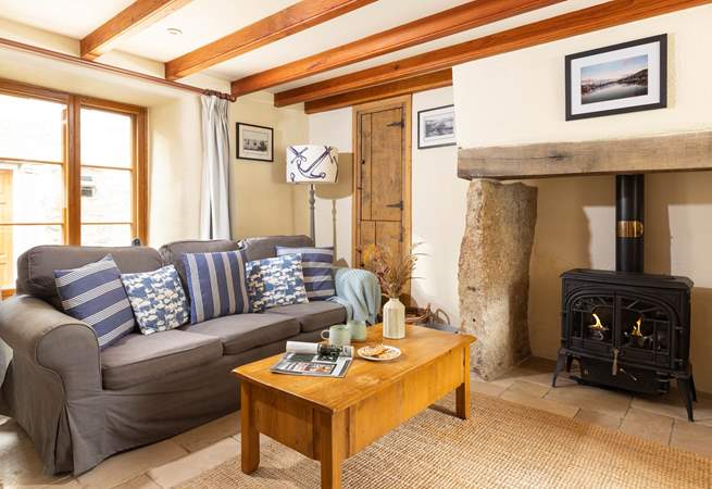 Sit back and relax by the cosy wood-burner.