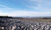 This is the beach at Kilve, an extraordinary part of the Area of Outstanding Natural Beauty. Explore the rocks for fossils, or follow the cliff path. - Thumbnail Image