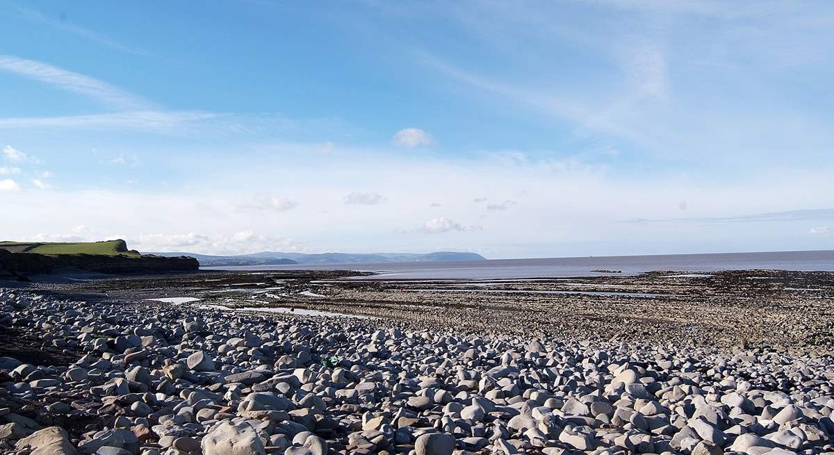 This is the beach at Kilve, an extraordinary part of the Area of Outstanding Natural Beauty. Explore the rocks for fossils, or follow the cliff path.