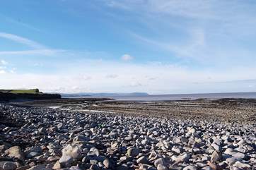 This is the beach at Kilve, an extraordinary part of the Area of Outstanding Natural Beauty. Explore the rocks for fossils, or follow the cliff path.