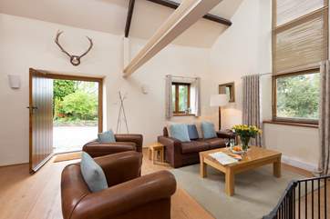 The extra wide doors let in the light and sunshine. Parking is right next to the cottage.