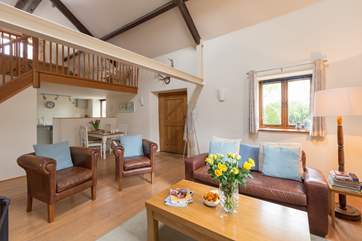 The open plan interior of Headford Farm Cottage is bright and spacious. There is a little fully enclosed courtyard at the back and a lovely grassy paddock for your dogs to enjoy or for you to sit and