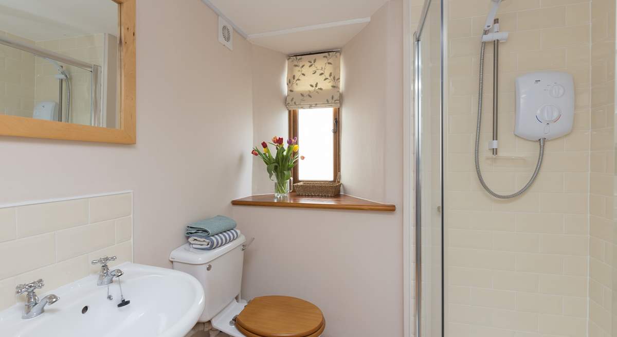 The shower-room is on the ground floor and offers plenty of space.