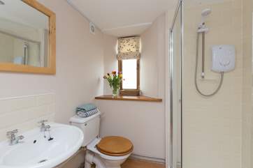 The shower room is on the ground floor and offers plenty of space.