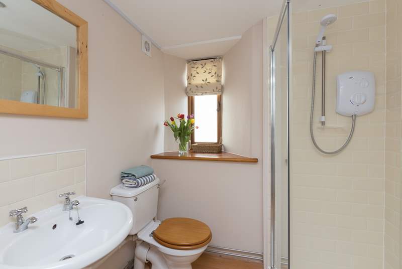 The shower room is on the ground floor and offers plenty of space.