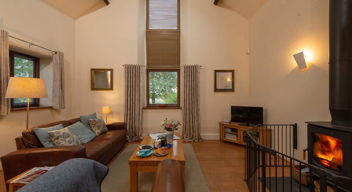 This beautifully converted barn has a lovely spacious living area with a wonderful wood-burning stove. Please note the fire guard is no longer in situ.