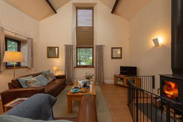 This beautifully converted barn has a lovely spacious living area with a wonderful wood burning stove. The fire guard is detachable.