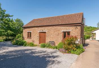 Headford Farm cottage is a very spacious barn conversion on a friendly working farm. The courtyard garden is at the back, and the two paddocks for you to use are to the left.