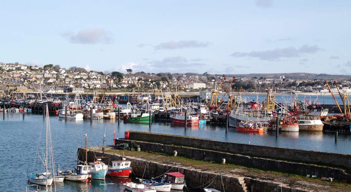 Newlyn Harbour is just six miles away.