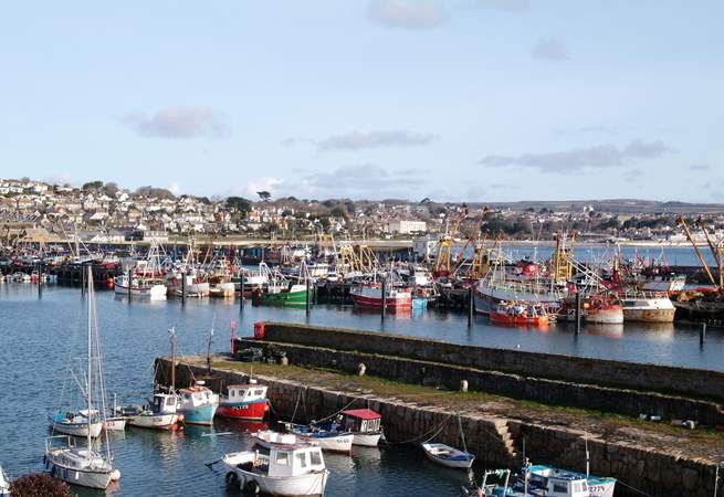 Newlyn Harbour is just six miles away.