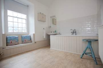 The large bathroom.