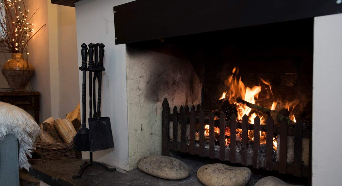 Relax by the roaring open fire.