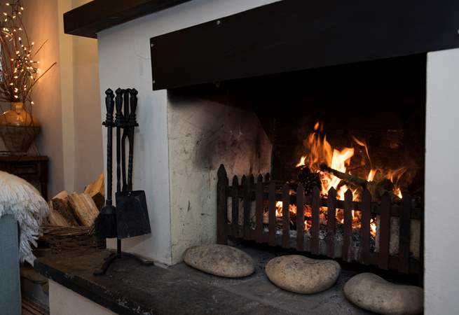 Relax by the roaring open fire.