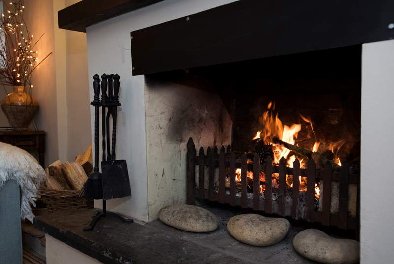 Relax by the roaring open fire.