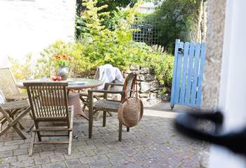 Enjoy dinner in the tranquil rear garden directly from the kitchen door.