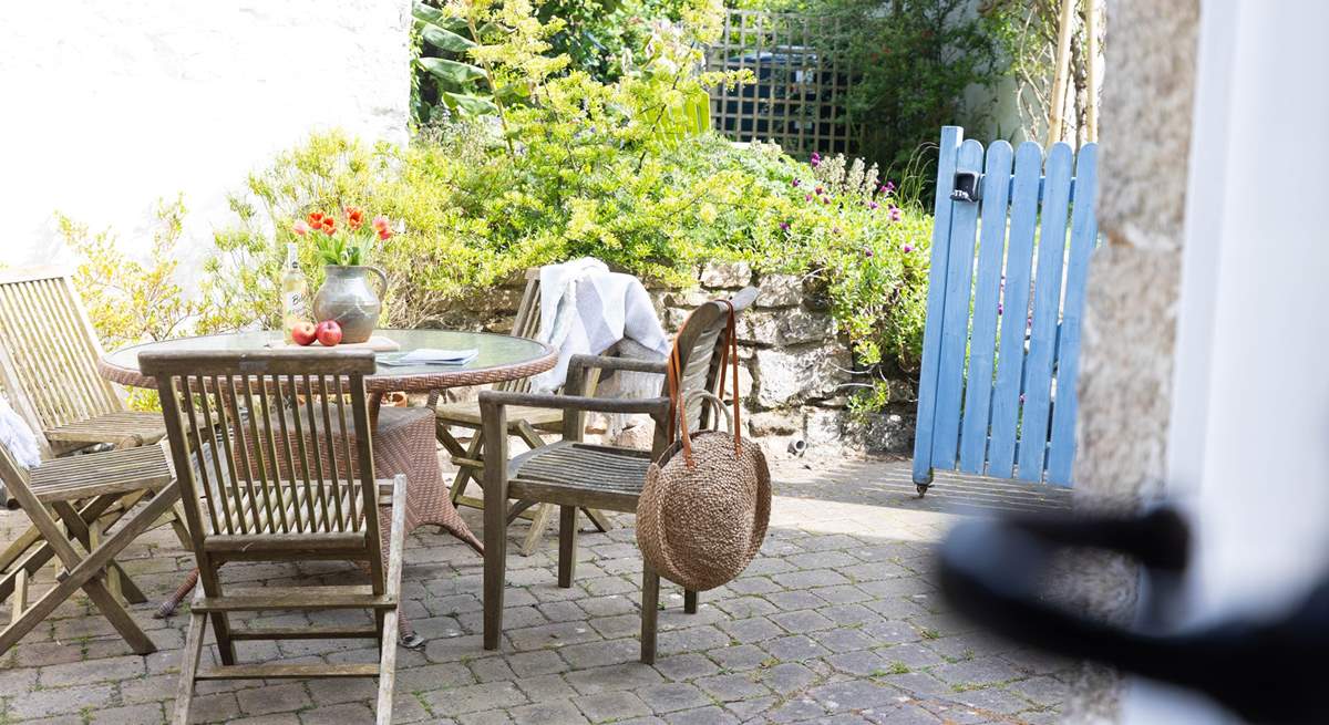 Enjoy dinner in the tranquil rear garden directly from the kitchen door.