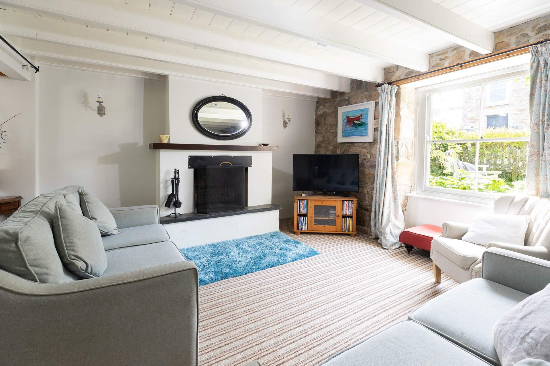 The huge original sash windows fill the rooms with light, the sitting-room has views of the charming front garden.