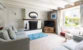 The huge original sash windows fill the rooms with light, the sitting-room has views of the charming front garden. - Thumbnail Image