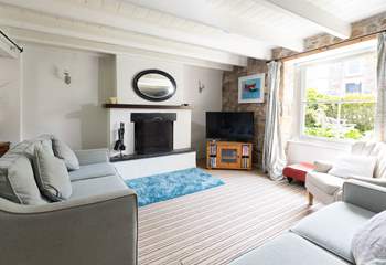 The huge original sash windows fill the rooms with light, the sitting-room has views of the charming front garden.