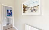 The owners original artwork is shown throughout this lovely cottage. - Thumbnail Image