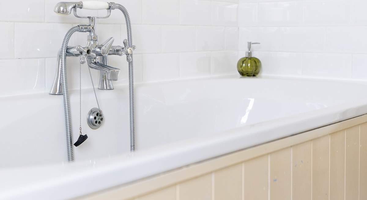 Wash away the sandy day in the huge bath.