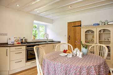 The eat-in kitchen is very charming.