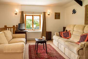 The sitting-room on the first floor where you can relax together.