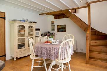 The oak stairs lead to the master bedroom and sitting-room.