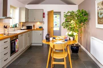 The stylish, light and well-equipped kitchen.