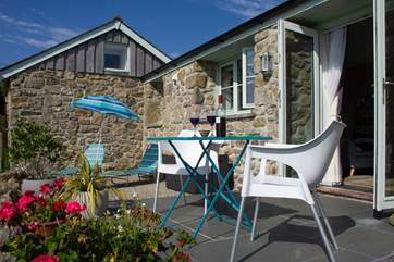 Sit on the patio terrace with a glass or two in this peaceful location.