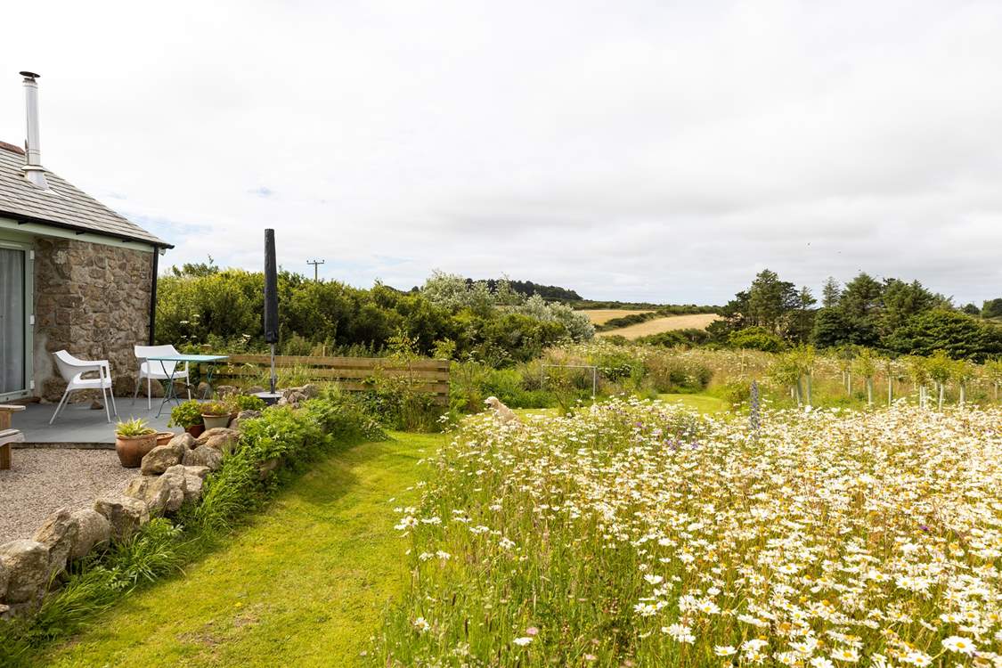 Sit on the patio terrace with a glass or two in this peaceful location.