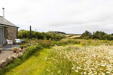 Sit on the patio terrace with a glass or two in this peaceful location.