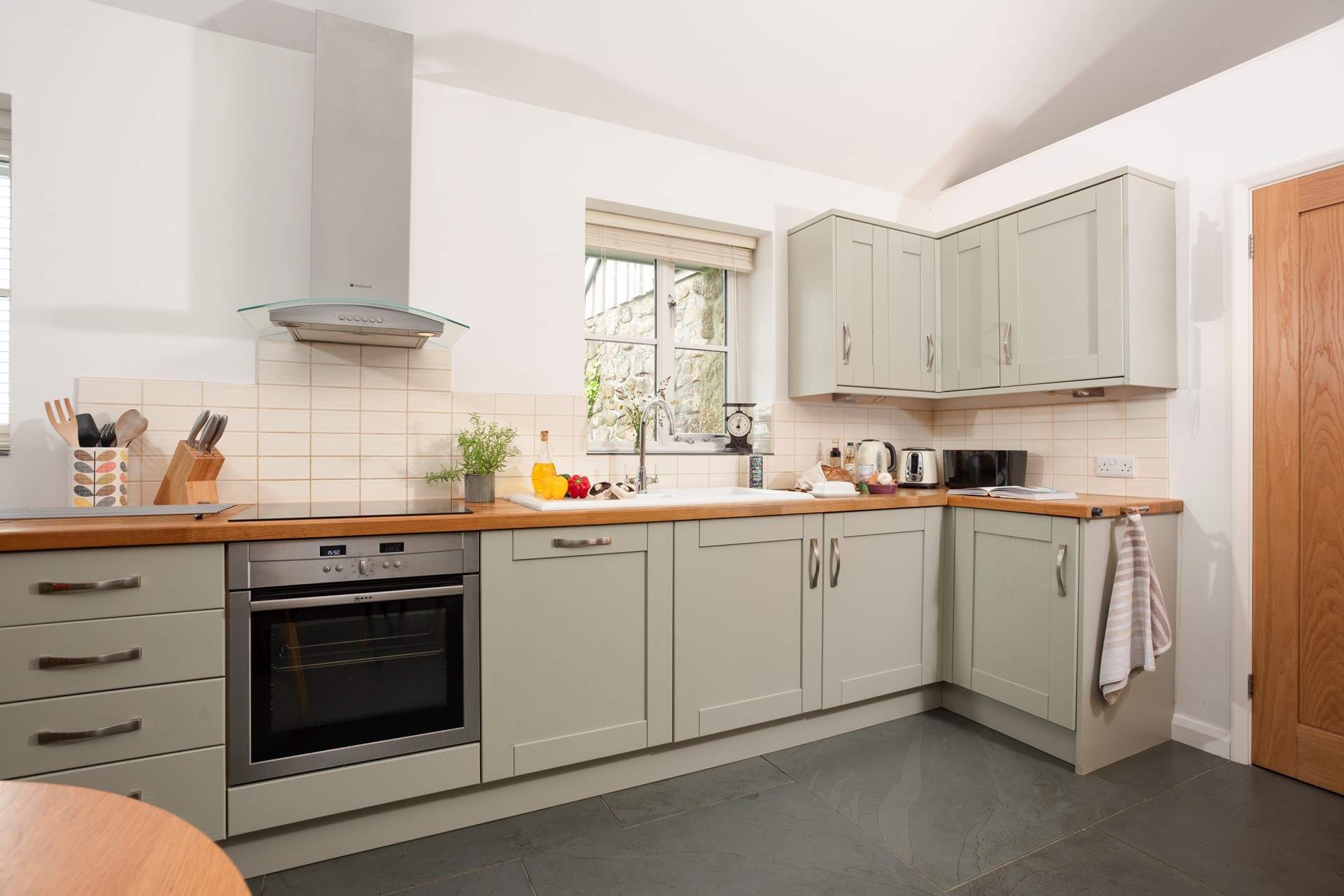 The kitchen is spacious and well equipped.