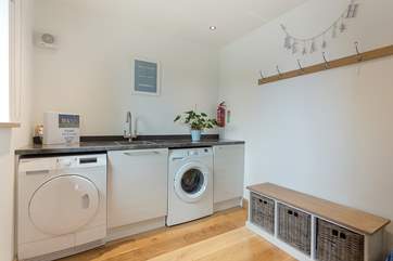 The big utility-room has plenty of space for storing wetsuits, body boards, buckets and spades.