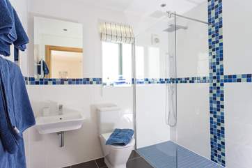 The en suite shower-room to Bedroom 1 has a big walk-in shower.