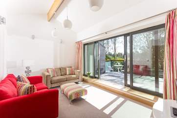 The sitting-room on the first floor opens out to a large balcony.