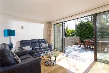 Doors open wide to join the living-area and terrace together.