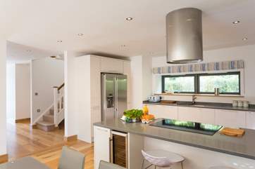 The living-area is open to the wide hallway.