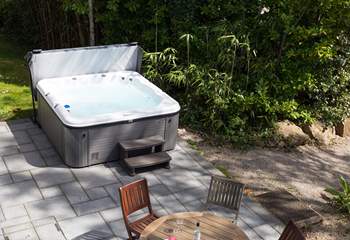 Your own private hot tub on the terrace outside.