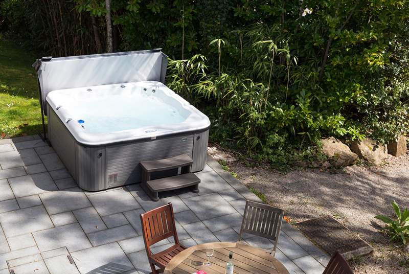 Your own private hot tub on the terrace outside.