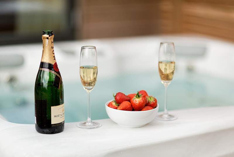 Champagne and a hot tub....perfect for romantic relaxation.