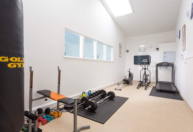 The gym is located in the poolhouse.