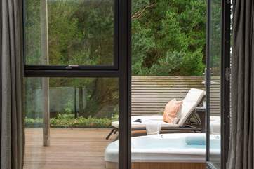 The hot-tub is right outside the bedroom door.