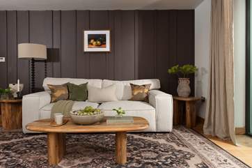 The cosy sitting area is just perfect to relax in at the end of a busy day exploring.