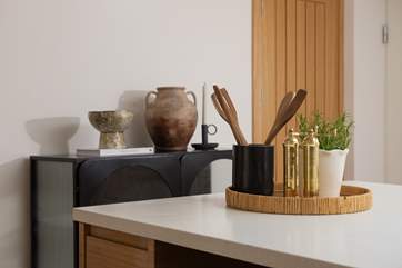 Simply sleek kitchen interiors sit perfectly with Cedar's more rustic styles.