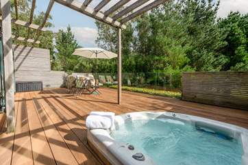 Enjoy a dip in the hot tub as the sun disappears and dusk sets in.