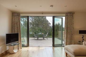 Doors open right up from the living-room onto the deck.
