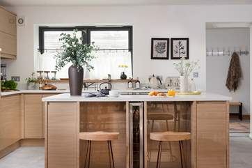 A lovely modern kitchen awaits you.